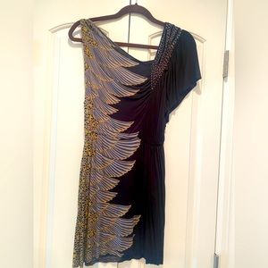 Little short Dress with sequin shoulder details.